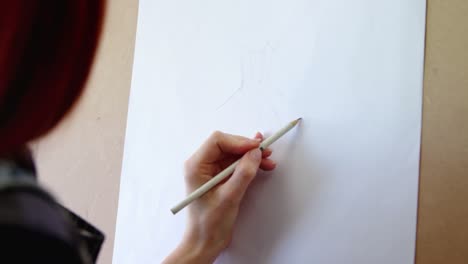 woman drawing sketch on canvas 4k