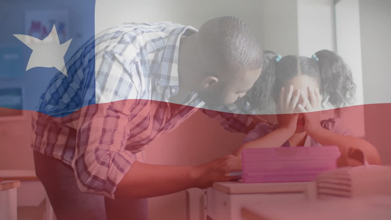 In school, teacher helping student with Texas flag animation overlay in classroom
