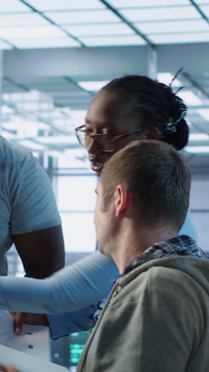 Diverse Business Team Collaborating and Discussing Project in Modern Office
