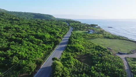 drone flying over panoramic road along coast, barahona in dominican republic