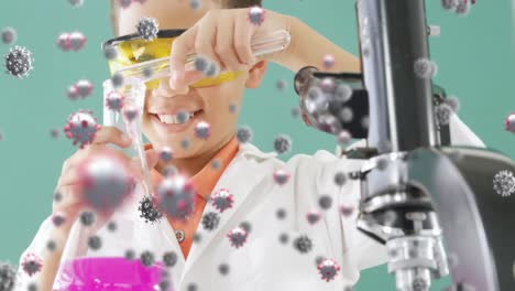 células de covid-19 contra un niño que realiza un experimento en el laboratorio