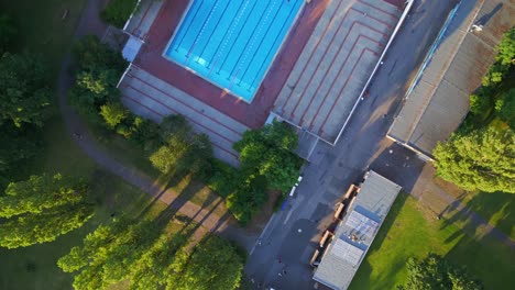 spectacular aerial top view flight berlin city public swimming pool germany in europe, summer day 2023