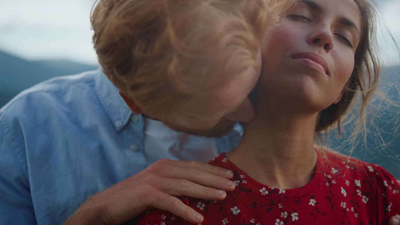 Sexy couple having date in mountains. Family enjoying summer honeymoon outdoor.
