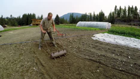 man using agricultural equipment in the farm 4k