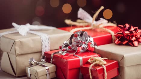 Animation-of-christmas-presents-over-blurred-background