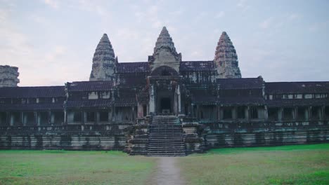 Angkor-Wat-temple-at-dawn-with-no-people,-reflecting-serenity-and-ancient-history