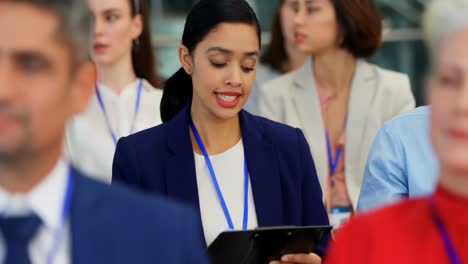 businesswoman interacting with speaker in the business seminar 4k