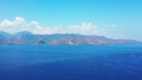 aerial view of tropical island of lombok, indonesia with mountain background