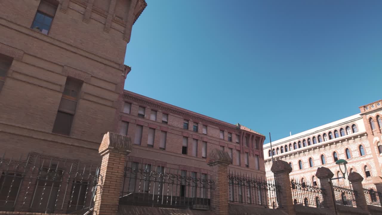Santa Teresa de Jesús School in Tarragona, historic charm and modern design, upward angle pan right