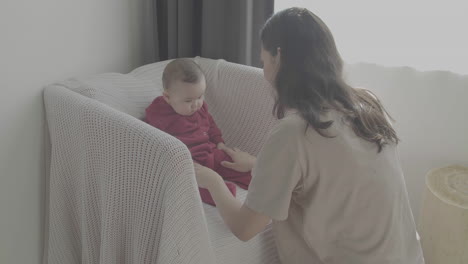 Mom-And-Cute-Baby-At-Home