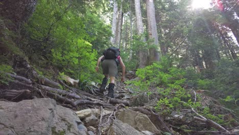 Man-Hiking-up-a-Steep-Mountain,-Mount-5040,-Vancouver-Island,-Canada