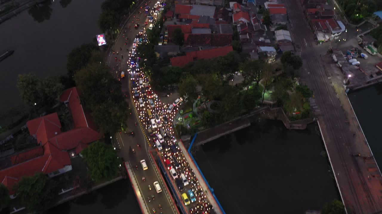Aerial perspective of the busy traffic in Indonesia, East Java, Surabaya at night