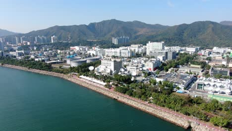 cluster of satellite broadcast dishes on hong kong, aerial view