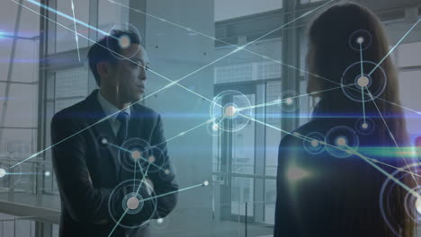 animation of network of connections over business people in office