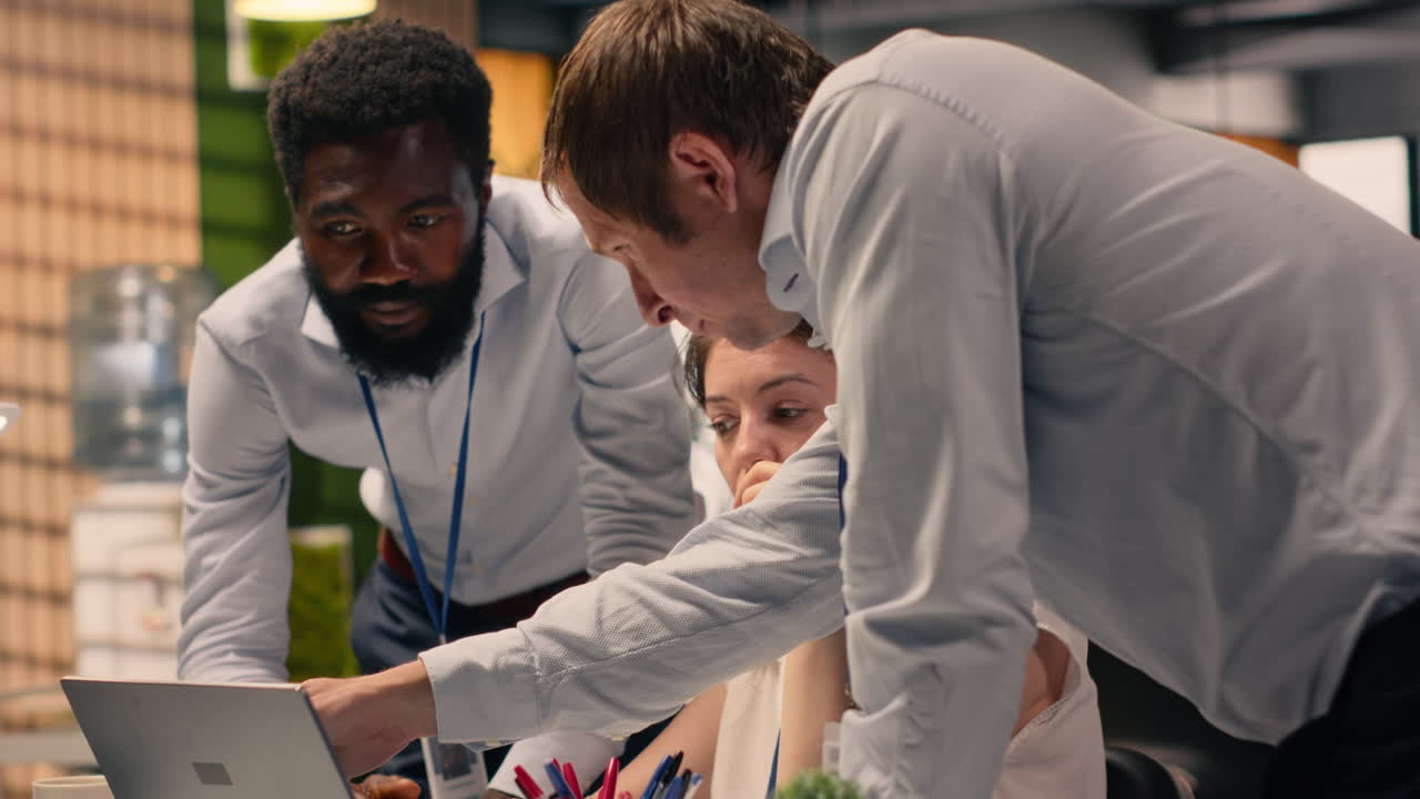 Multinational company work team collaborating on performance metrics