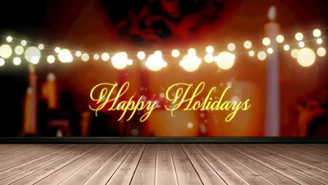 Happy-holidays-text-and-glowing-yellow-fairy-light-decoration-hanging-over-wooden-plank