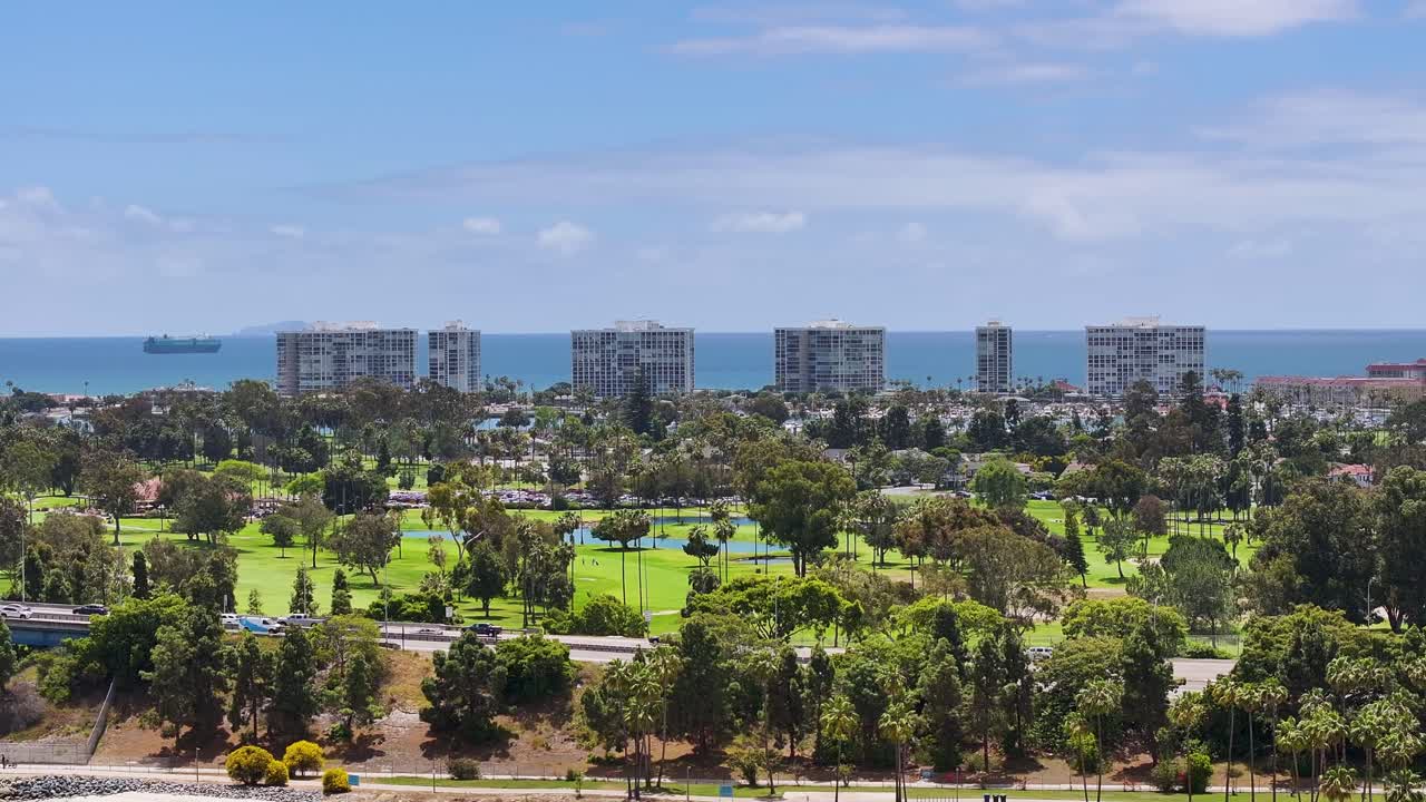 Aerial pan of Coronado condos and Municipal Golf Course San Diego, tight view