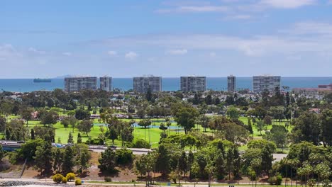 aerial pan of coronado condos and municipal golf course san diego, tight view