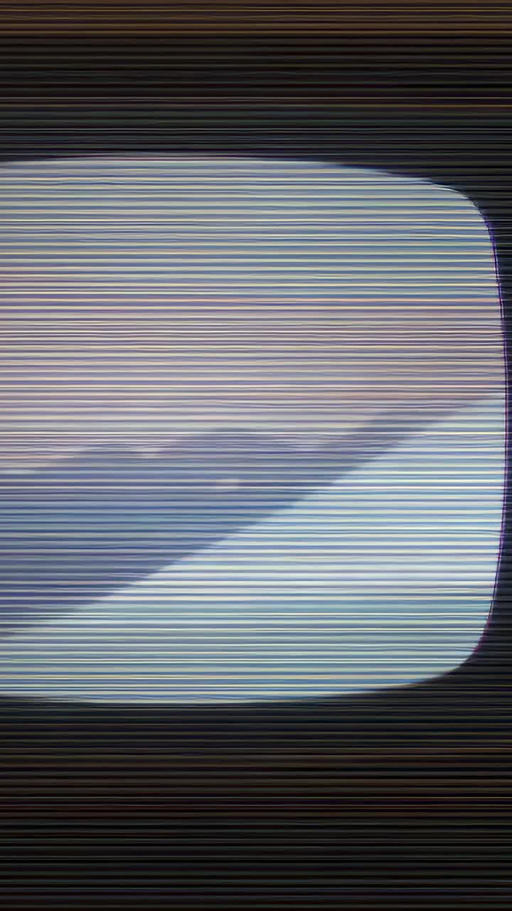 Vertical video: Showing CRT TV screen receiving weak signal in dark room, revealing scan-lines