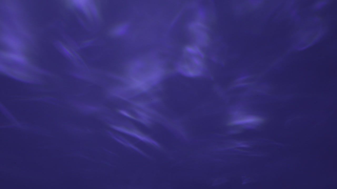 White abstract background with smoothly fading waves