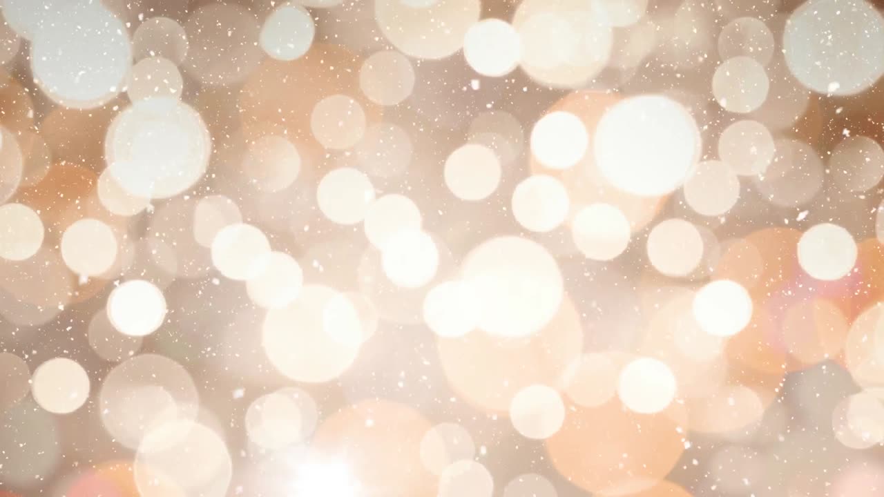 nieve cayendo con círculos de navidad de luz bokeh