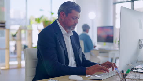 typing, computer and mature man in office writing