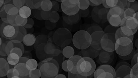 desenfocado blanco y negro abstracto vacaciones luces borrosas está parpadeando en fondo oscuro