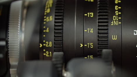 two motors moving the iris and focus on a cinema lens with yellow markings