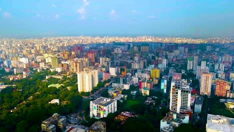 aerial backward megacity dhaka in bangladesh, poor third world country in half sunlight and half cloud shadow