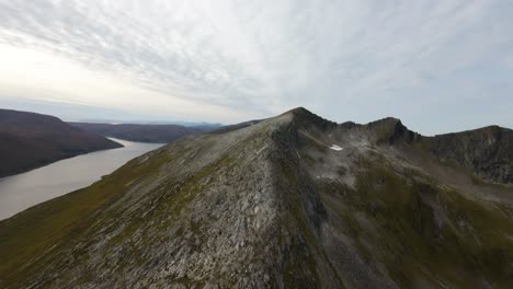 A-relaxed-flight-along-mountains-in-northern-Norway