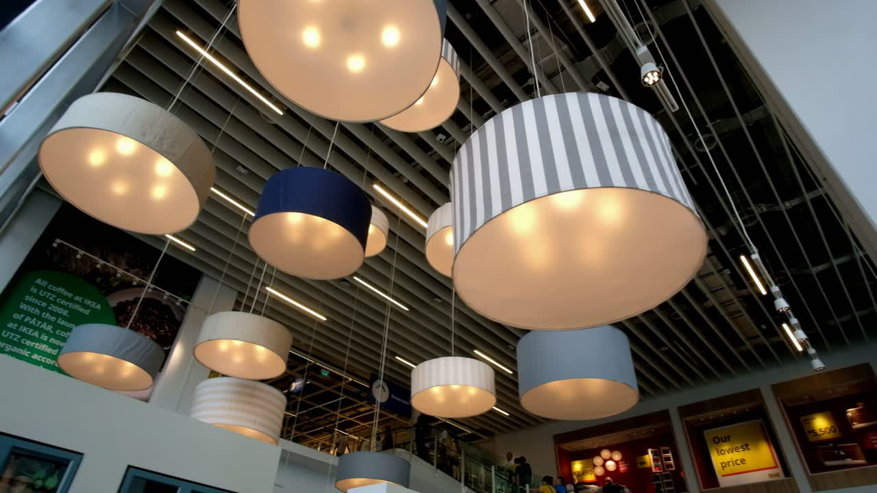 A large home furnishings shop in Pasay City, Philippines, has several impressive ceiling lights installed right at the lobby.