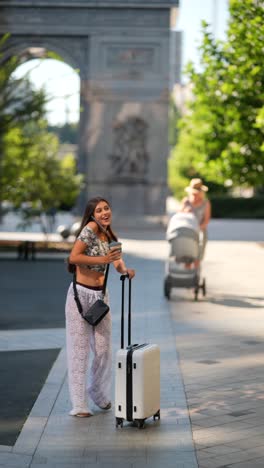 woman traveling through city park