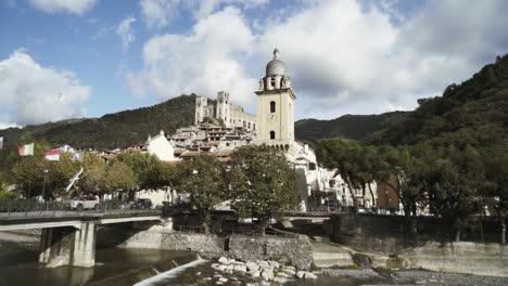 picturesque mountain village with bridge and river