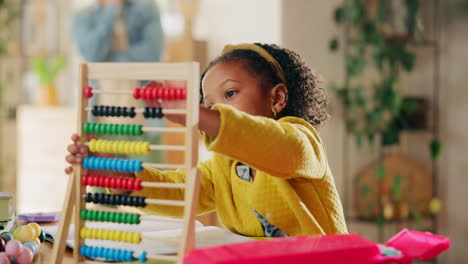 young girl learning with abacus