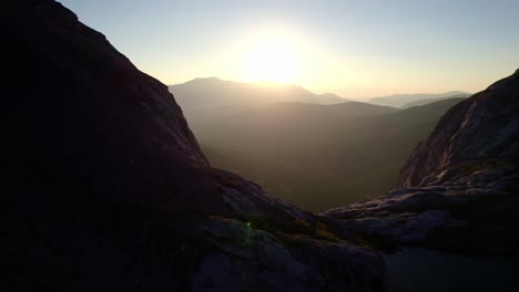 aerial fly foward sunrise alpine carnarvon lake, kananaskis, alberta, canada