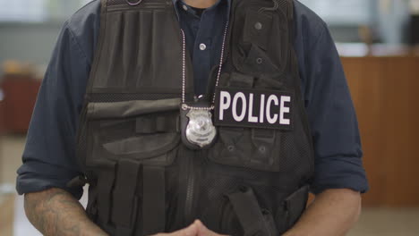 African-american-police-officer-smiling-friendly