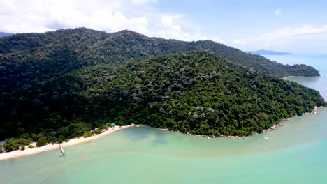 Panning-shot-revealing-the-stunning-Keracut-Beach,-Malaysia