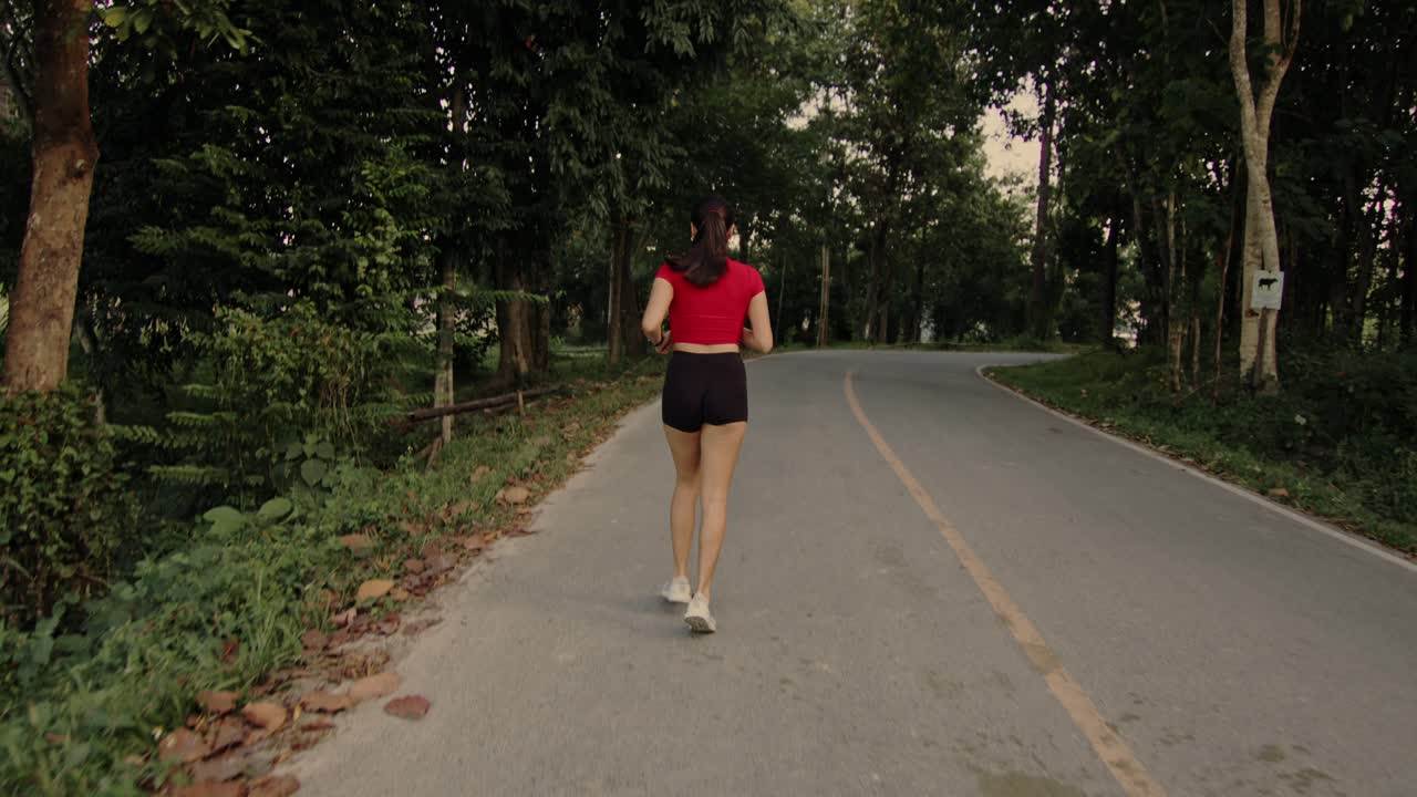 Woman Running in the Countryside