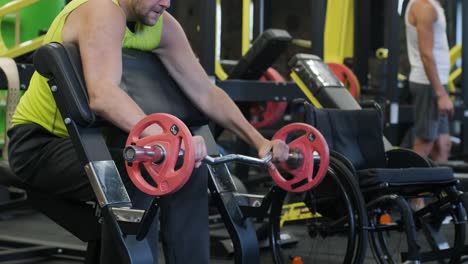 man with disabilities training in the gym of rehabilitation center