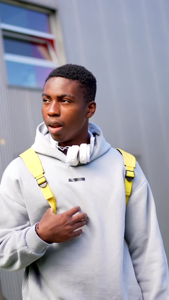 Teenage students chatting on campus