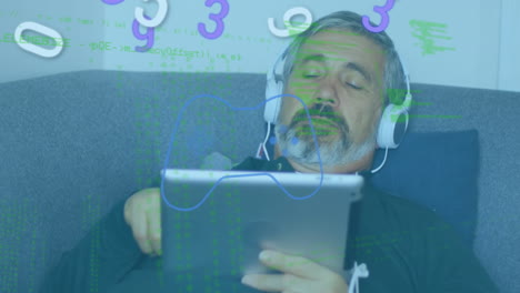animation of numebrs and data processing over caucasian man with tablet and headphones