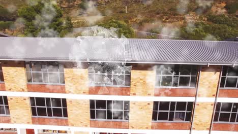 animation of macro covid 19 cells over school