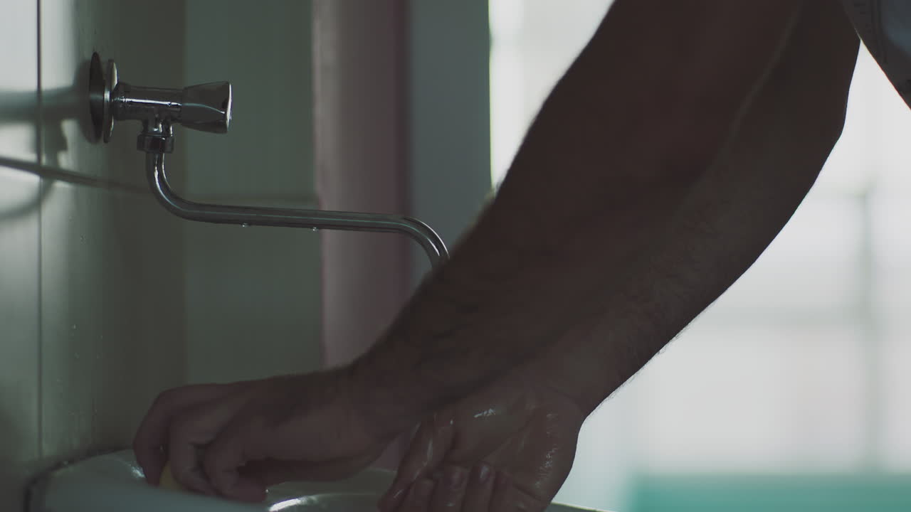 Washing hands in the sink