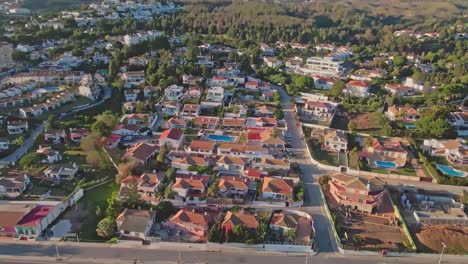 aerial reveal of residential district on south of spain
