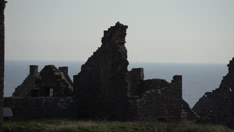 Stunning-close-up-of-Dunnottar-Castle-ruins-in-Scotland,-overlooking-the-majestic-ocean