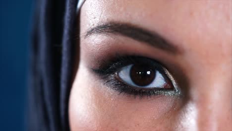 close-up of a woman's eye with hijab