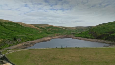 drone aerial footage of yorkshire countryside valleys moorland and reservoir water-2