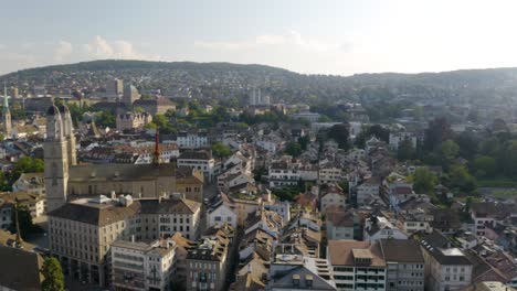 aerial pan left reveals limmat river in downtown zurich