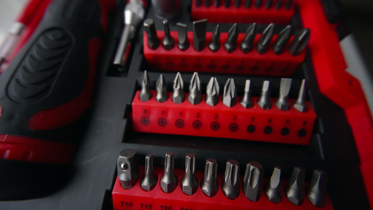 Close up shot of a professional tool kit with screwdriver bits and sockets neatly organized