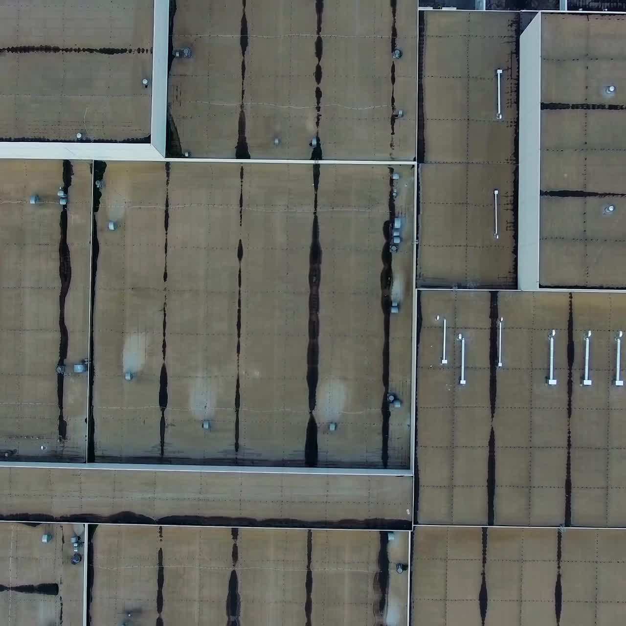 View from above on very big modern factory. Up to date production zone. Huge factory in the countryside